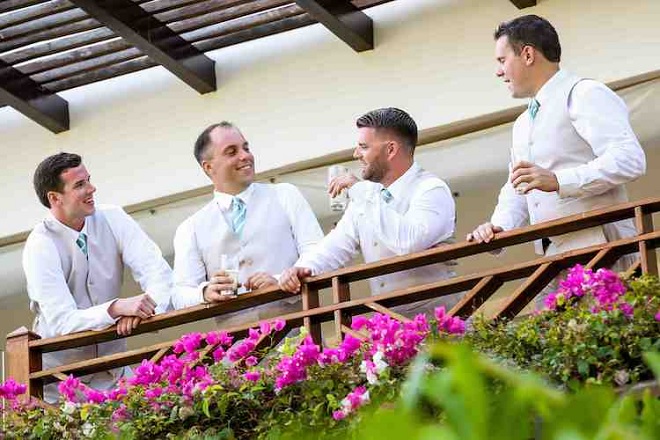 Grand Velas - Men on Balcony